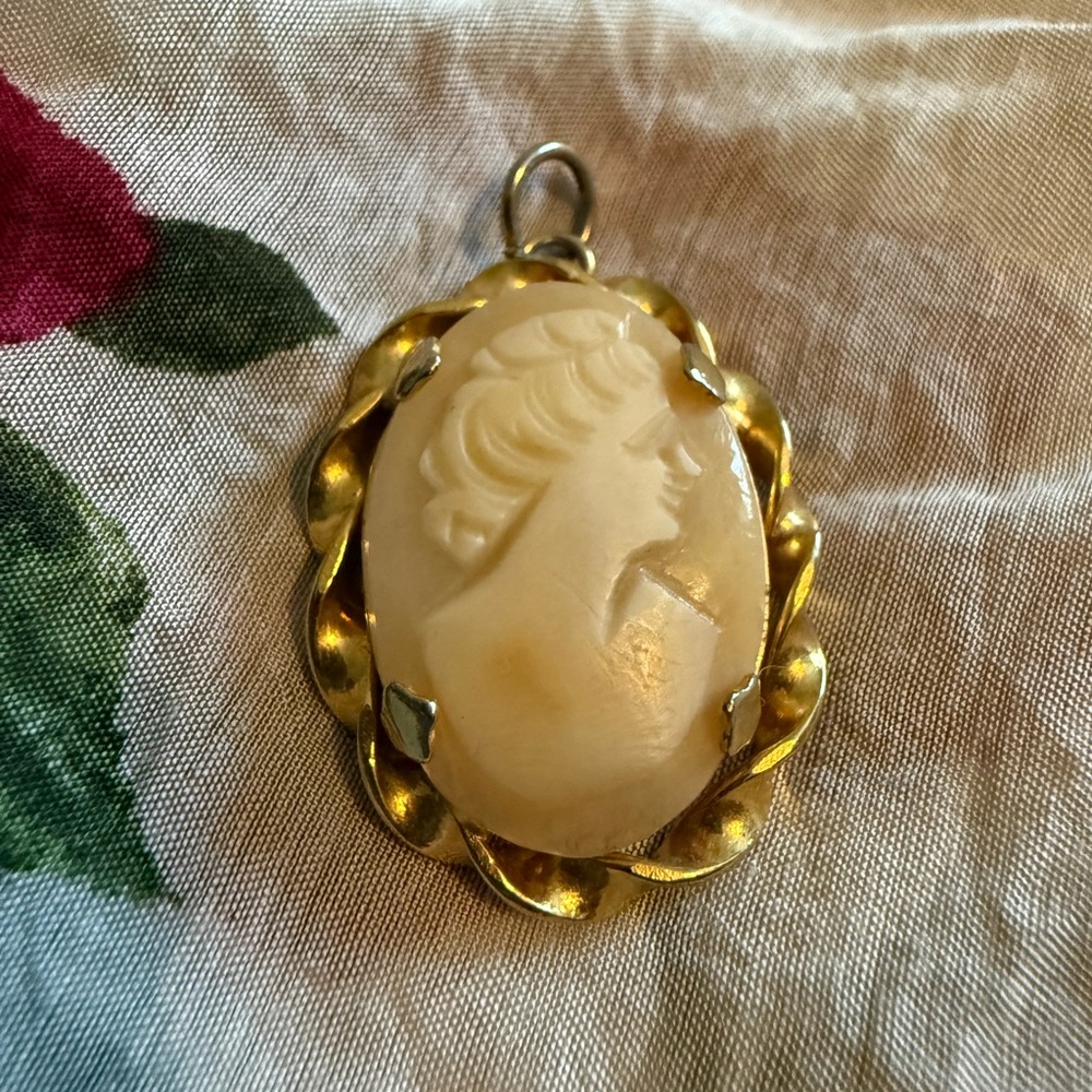 Elegant Gold Cameo Pendant